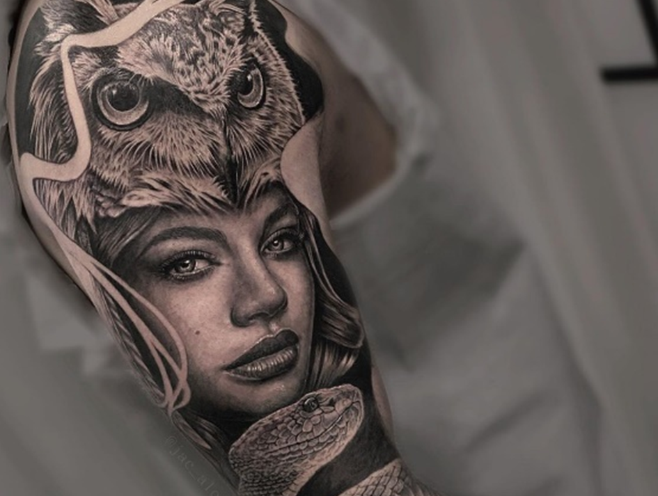 skilled tattoo artist specialized in black and grey realism tattoos